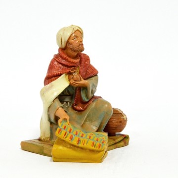 Statua Uomo su Tappeto...