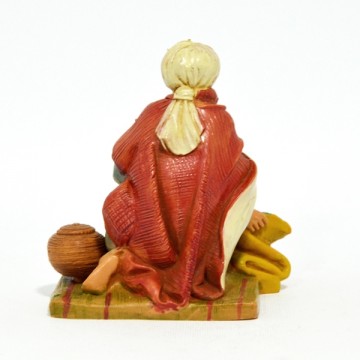 Statua Uomo su Tappeto...