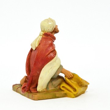 Statua Uomo su Tappeto...