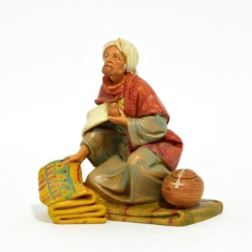 Statua Uomo su Tappeto...