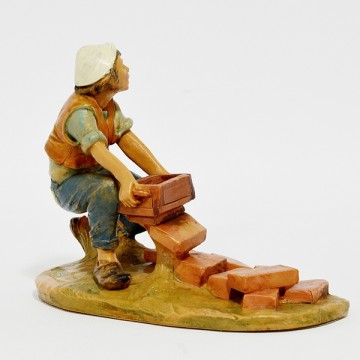 Statua Uomo con Mattoni...