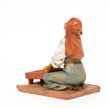 Statua Donna che Impasta...