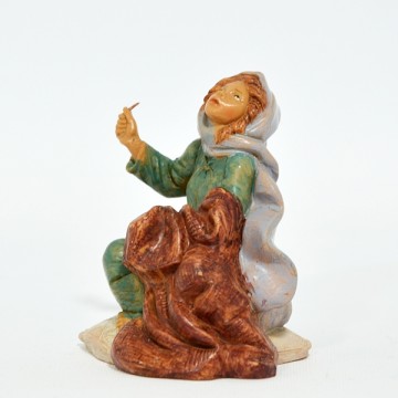 Statua Donna che Cuce...