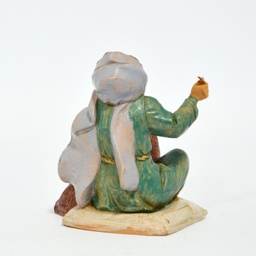 Statua Donna che Cuce...