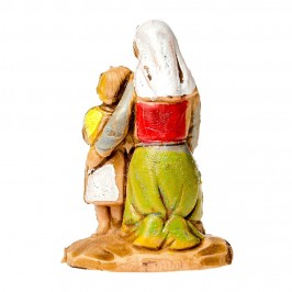 Donna inginocchiata con Bambina per il Presepe