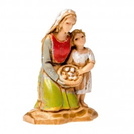 Donna inginocchiata con Bambina per il Presepe
