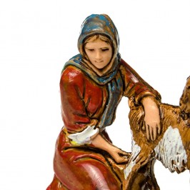 Donna in Ginocchio che Munge la Capra